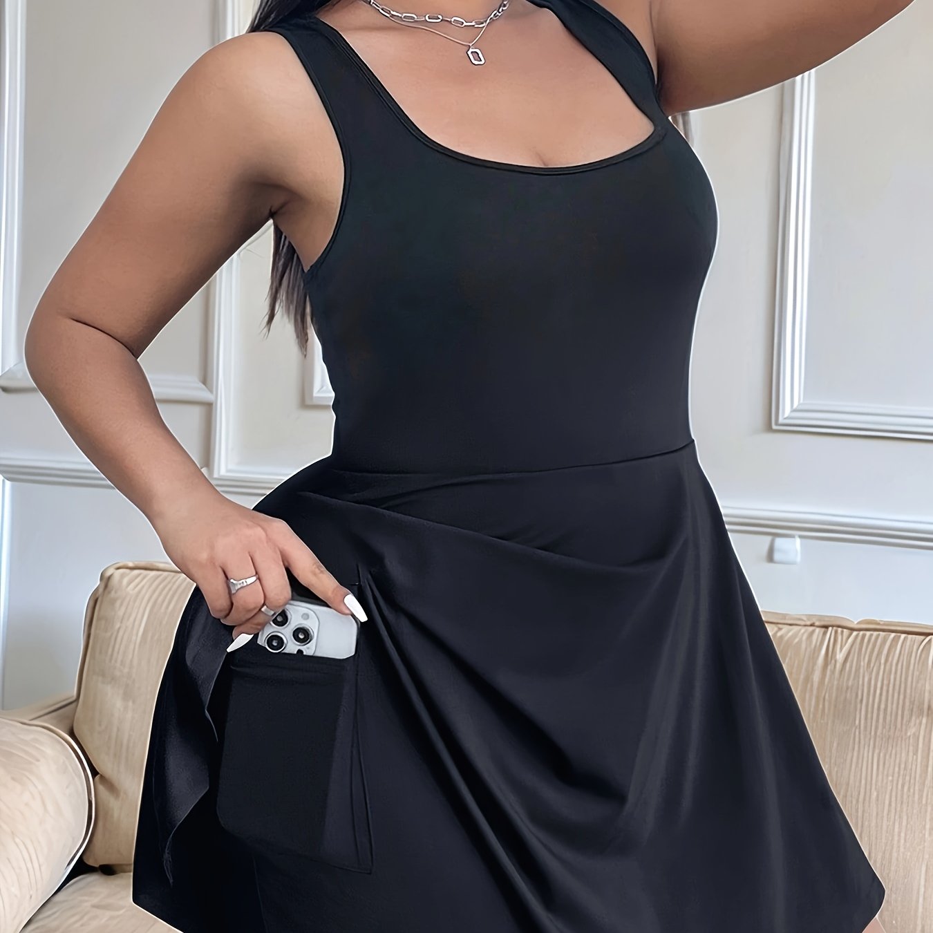 Mono sin mangas para mujer de talla grande en negro con bolsillos, casual y de poliéster elástico