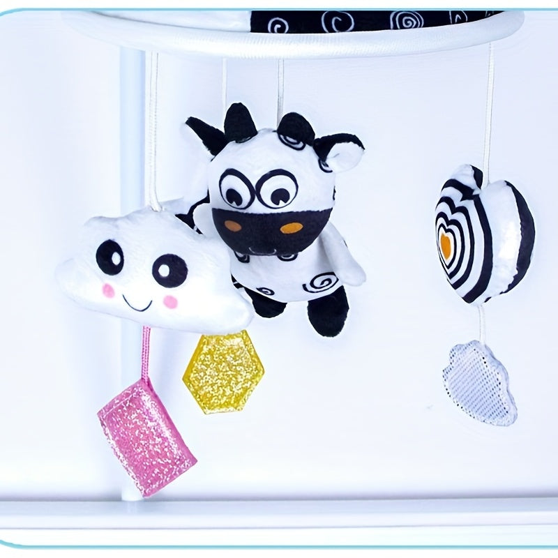 Mashina osilgan shamol chimi qora va oq parasol dizayni bilan, erta ta'lim uchun ideal va tinch uyqu muhitini yaxshilash uchun mo'ljallangan. Halloween yoki Rojdestvo uchun sovg'a sifatida mukammal.