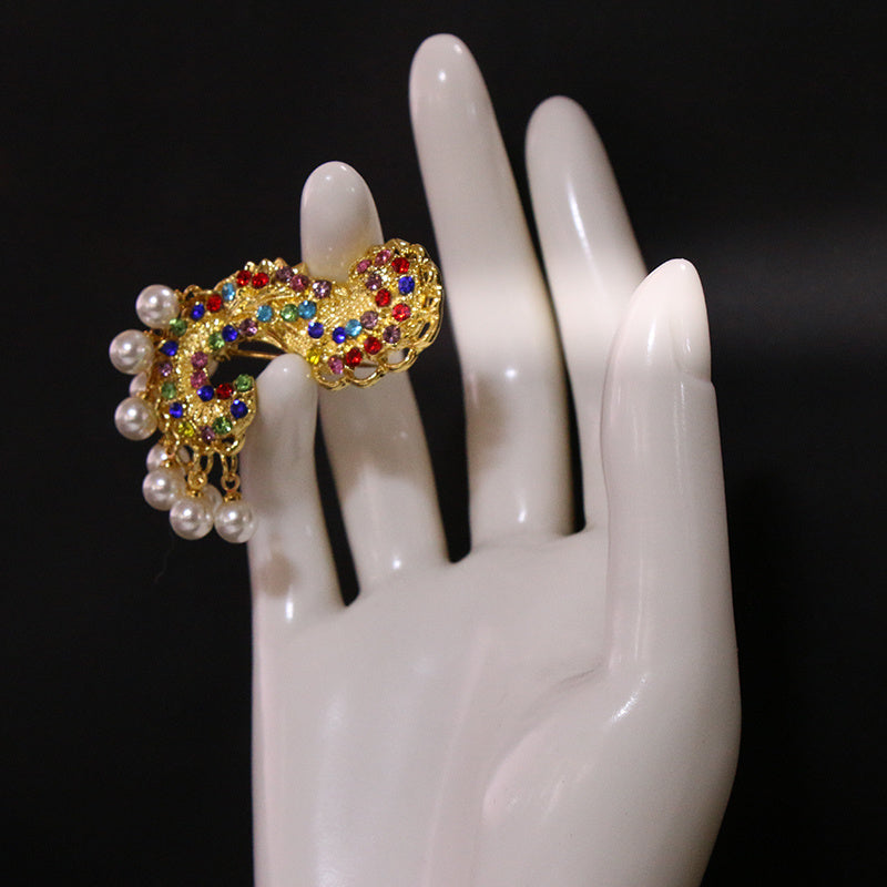 Ayollar uchun mo'ljallangan hashamatli noaniq shakldagi brosh pin va rhinestones bilan qoplangan emal