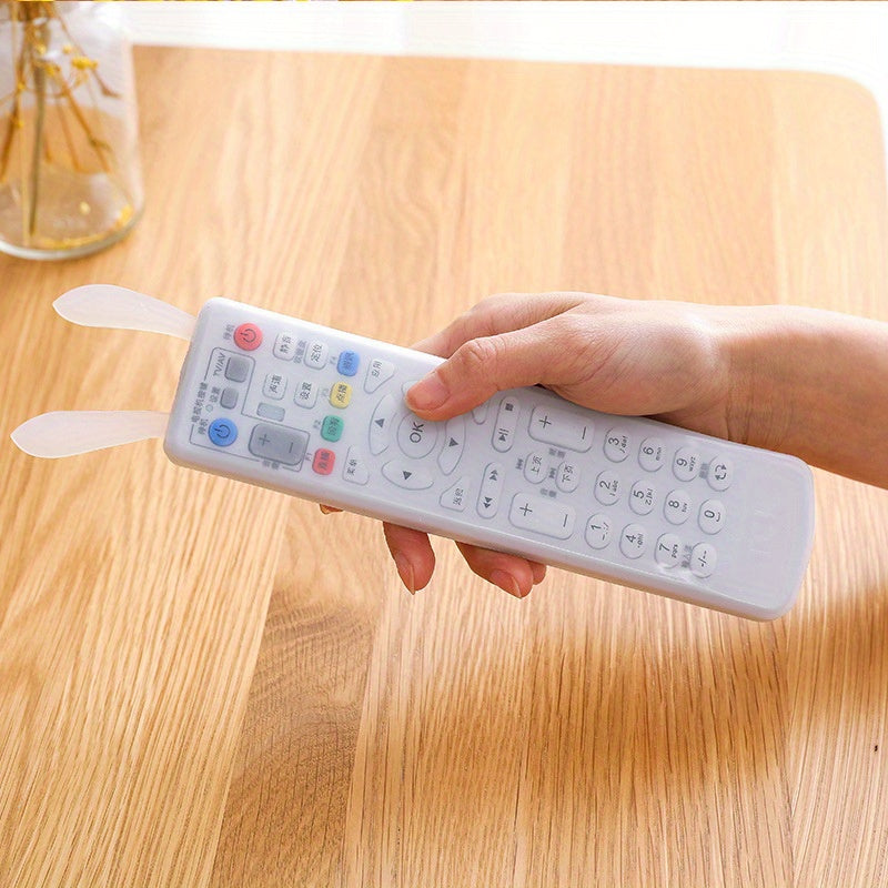 Funda de plástico con diseño de conejo adorable, universal, a prueba de agua y polvo para control remoto de aire acondicionado y televisión