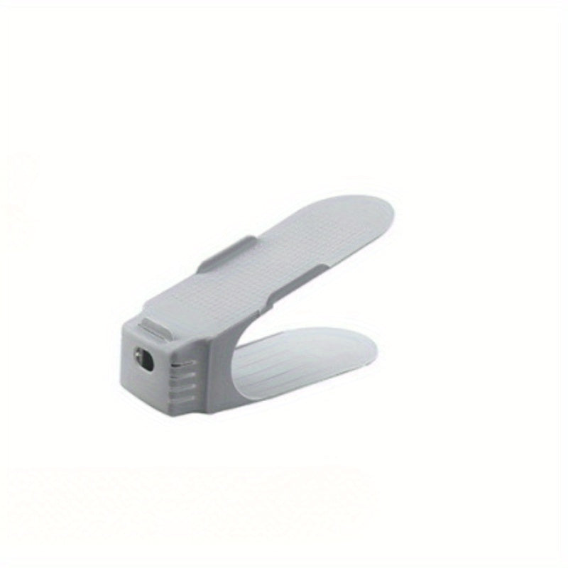 Регулируемая двухуровневая полка для обуви — эффективное решение для экономии места при хранении тапочек и обуви, идеально подходит для организации пространства дома и в общежитии.