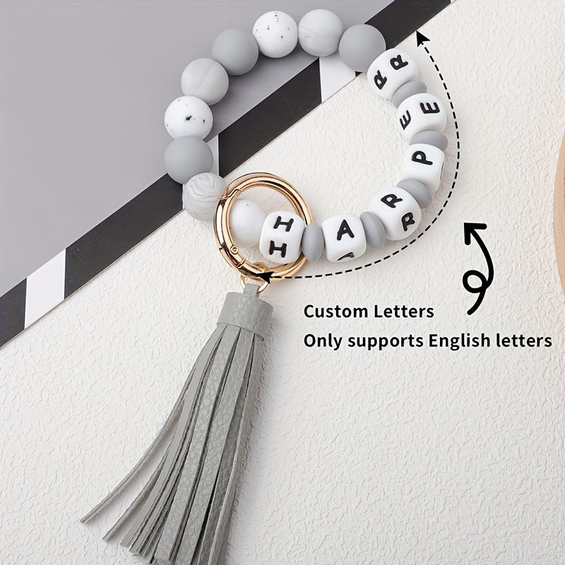 Maxsus PU charm bilan silikon teshiklar va tassel bilan nom yoki bosh harflar uchun