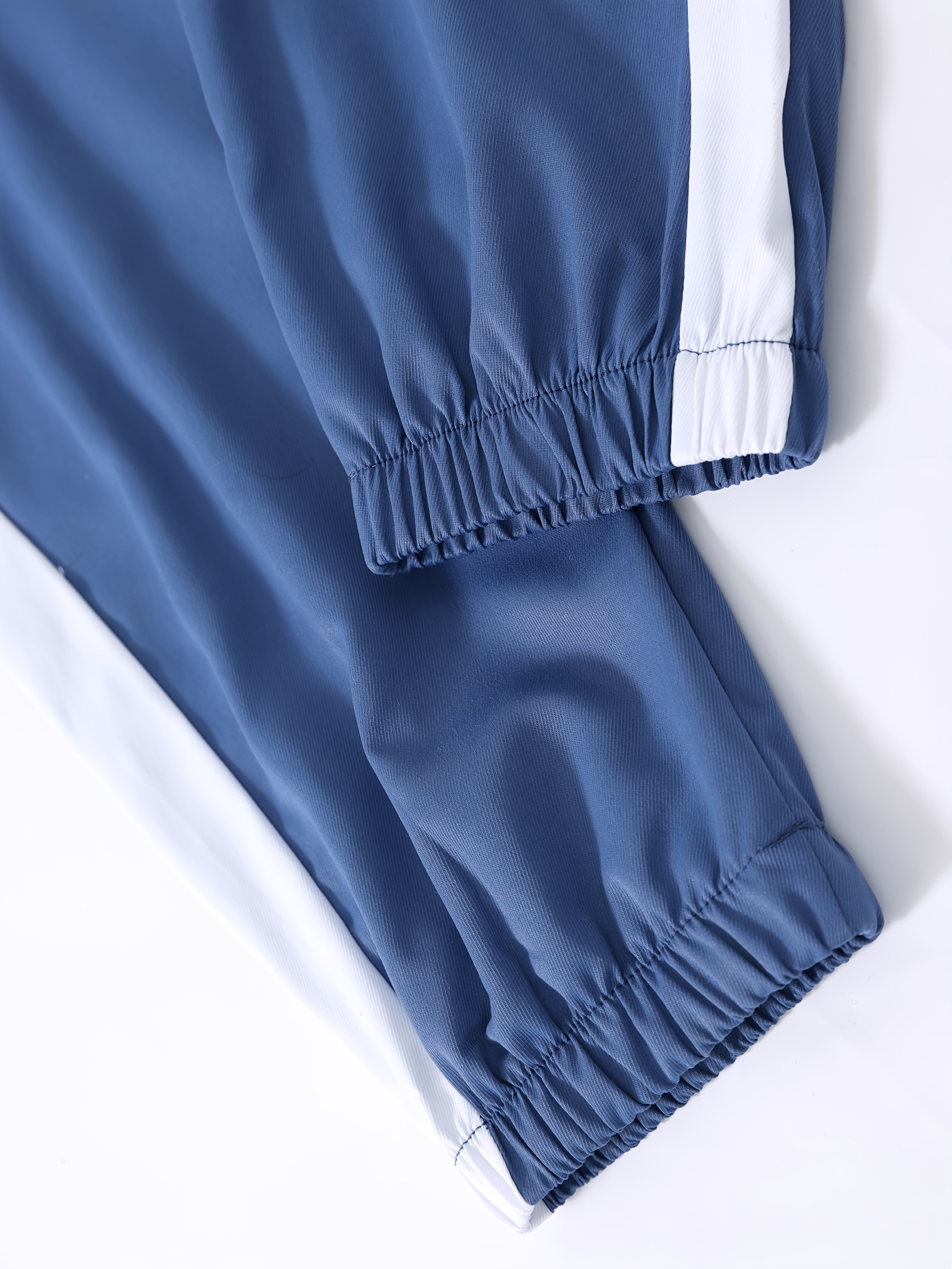 Conjunto deportivo de poliéster con bloque de colores y capucha para hombre, ideal para correr, entrenar y actividades al aire libre