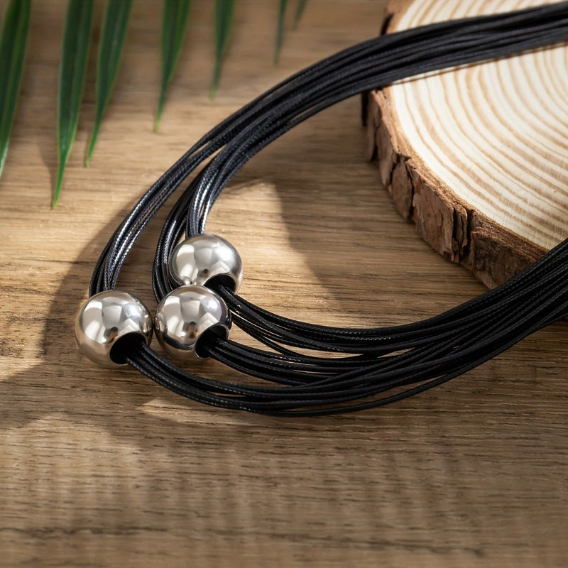 Black Beaded Necklace with Multilayer Design and Metallic Spherical Accents for Parties