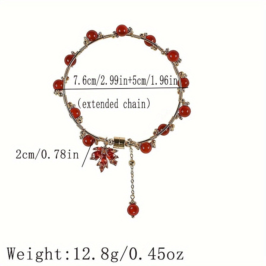 Vintage nafis uslubdagi bilaguzuk, nozik qizil xarang yaproqlari bilan pendanti, mis zargarlikdan tayyorlangan. Ushbu omadli qo'l ipi ayollar uchun mos keladi.