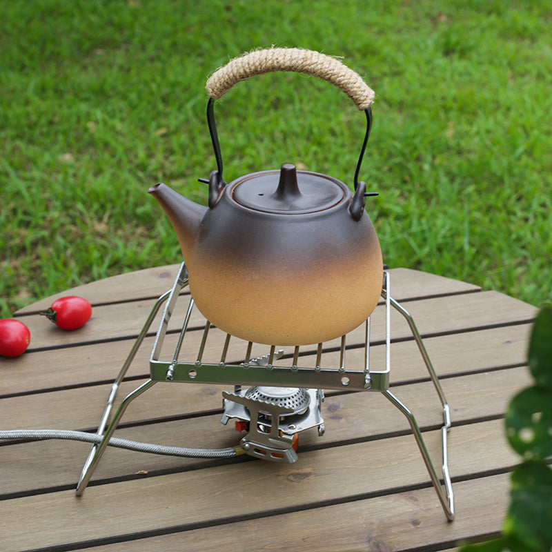 Tashqarida pishirish va BBQ uchun barqarorlashtiruvchi oyoqlarga ega kompakt zanglamaydigan po'latdan yasalgan sayohat grill.