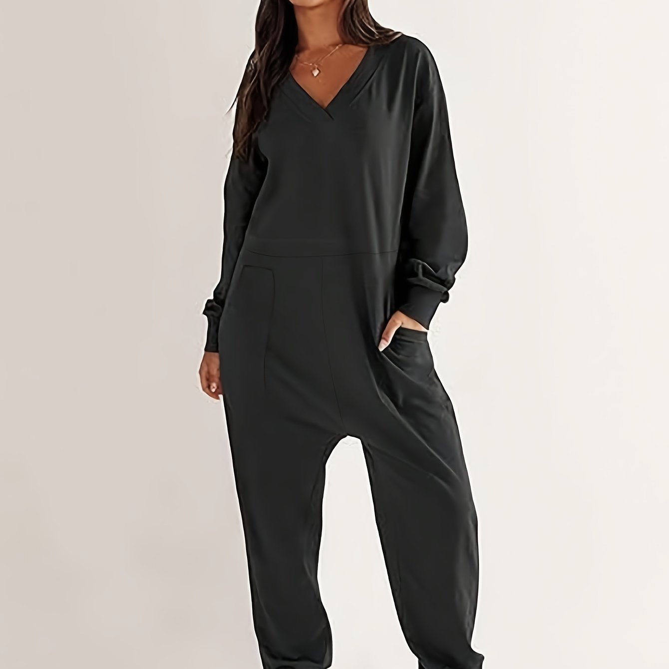 Mono sin mangas de talla grande para mujer con escote en V profundo y hombros caídos, color negro