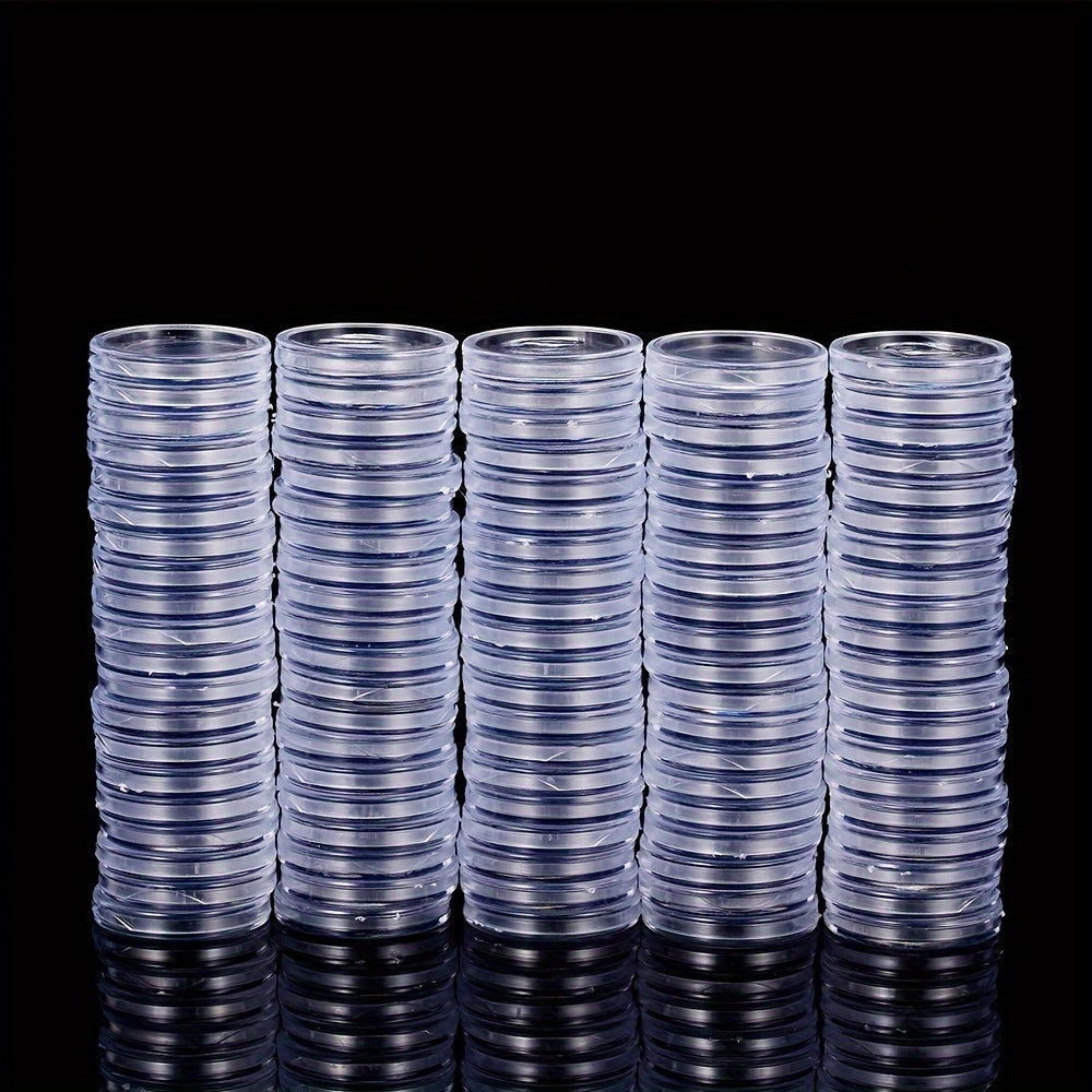 Прозрачные коробки для защиты монет доступны в упаковках по 25, 50 или 100 штук. Подходят для коллекционных предметов размером 19-33 мм, идеально подходят для памятных монет и медалей.