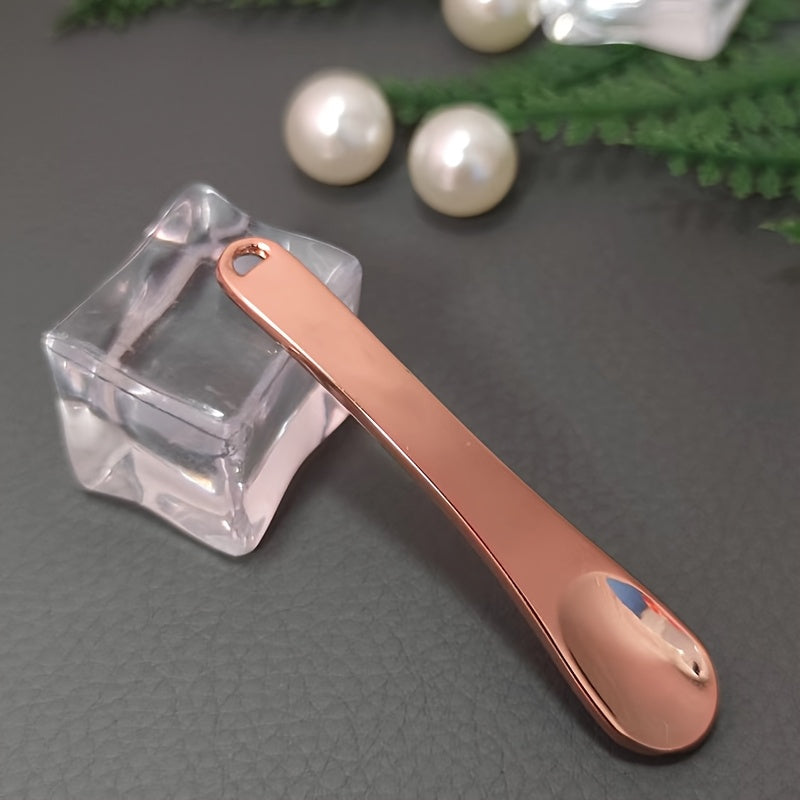 Sink qotishmasi ko'z kremi qoshiq va yuz niqobi qo'llash uchun massaj tayoqchasi - batareya talab qilinmaydi, ideal 14-fevral sovg'asi, silliq tugatish, sink qotishmasi materiali, yuz massajeri.