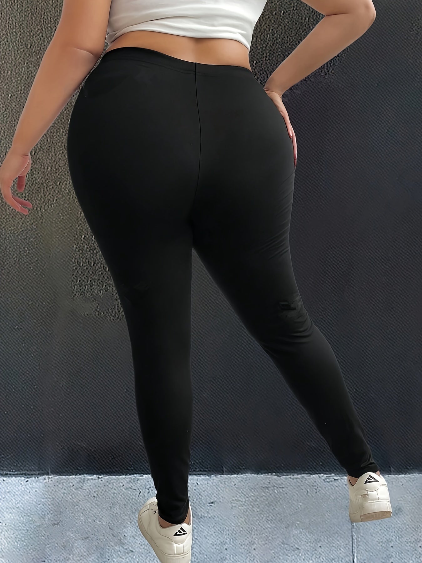 Leggings de mujer talla grande negras con tela elástica cómoda cintura ajustable moda casual