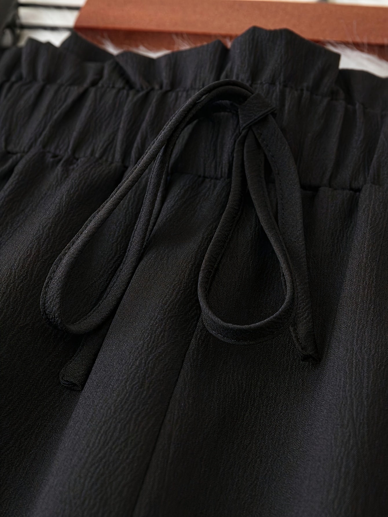 Pantalones de pierna ancha de talla grande con cintura tipo paper bag y lazo en el frente para primavera y verano