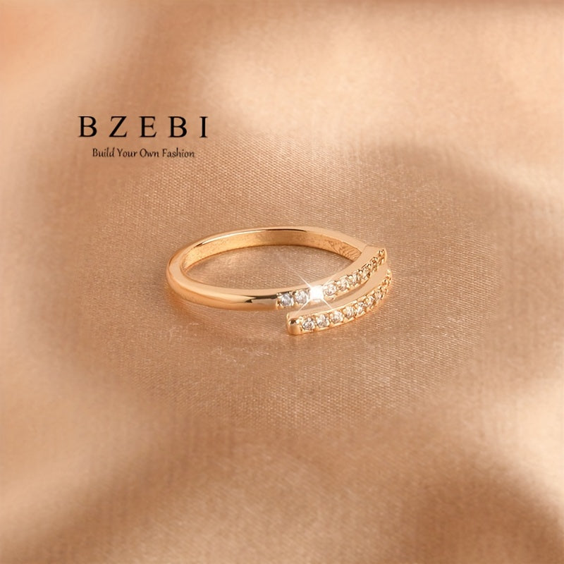 Anillo cruzado ajustable con circonia cúbica en oro de 18K para piel sensible