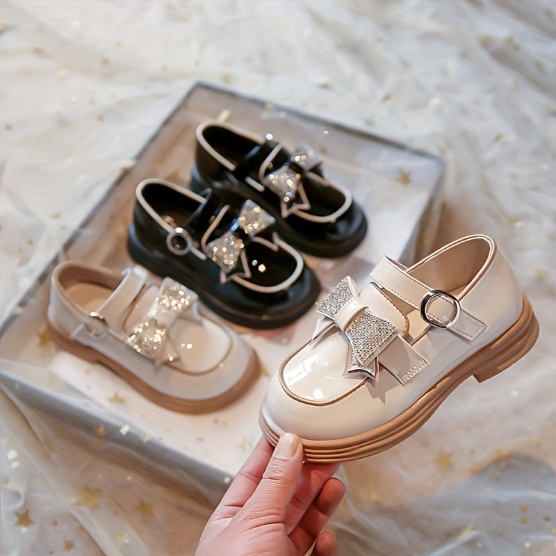 Qizlar uchun zamonaviy, nafis bog‘ichli Mary Jane poyabzallari, sirpanmaydigan tagliklar bilan, bahor va kuzda partiyalar uchun mukammal.