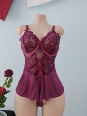 Plus Size Women's Deep V Floral Bodycon Bodysuit with Bow and Steel Ring