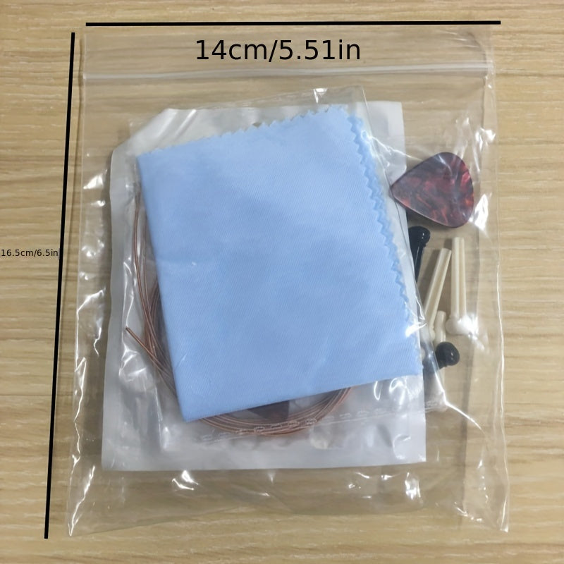 Set de accesorios para guitarra para principiantes incluye cuerdas, púas, afinador y herramientas en color aleatorio