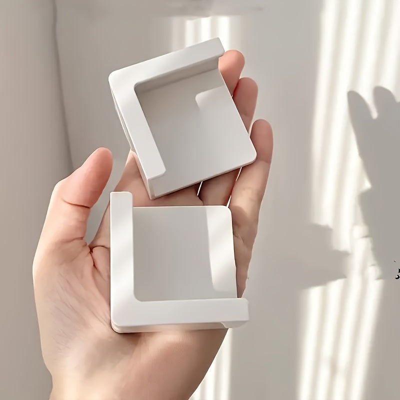 Juego de 2 soportes de plástico para teléfono y tableta de pared con adhesivo, sin taladro, que ahorra espacio