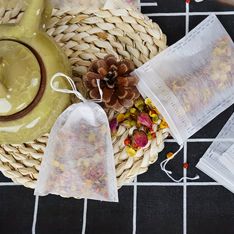 10 yoki 20 dona tortish qopqog'i bilan bir martalik choy filtr sumkalari, choy va ziravorlarni tayyorlash uchun to'qilmagan matodan tayyorlangan