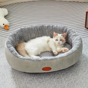 Oval Pet Bed for Cats and Dogs Cozy Classic Design All-Season Plush Nest