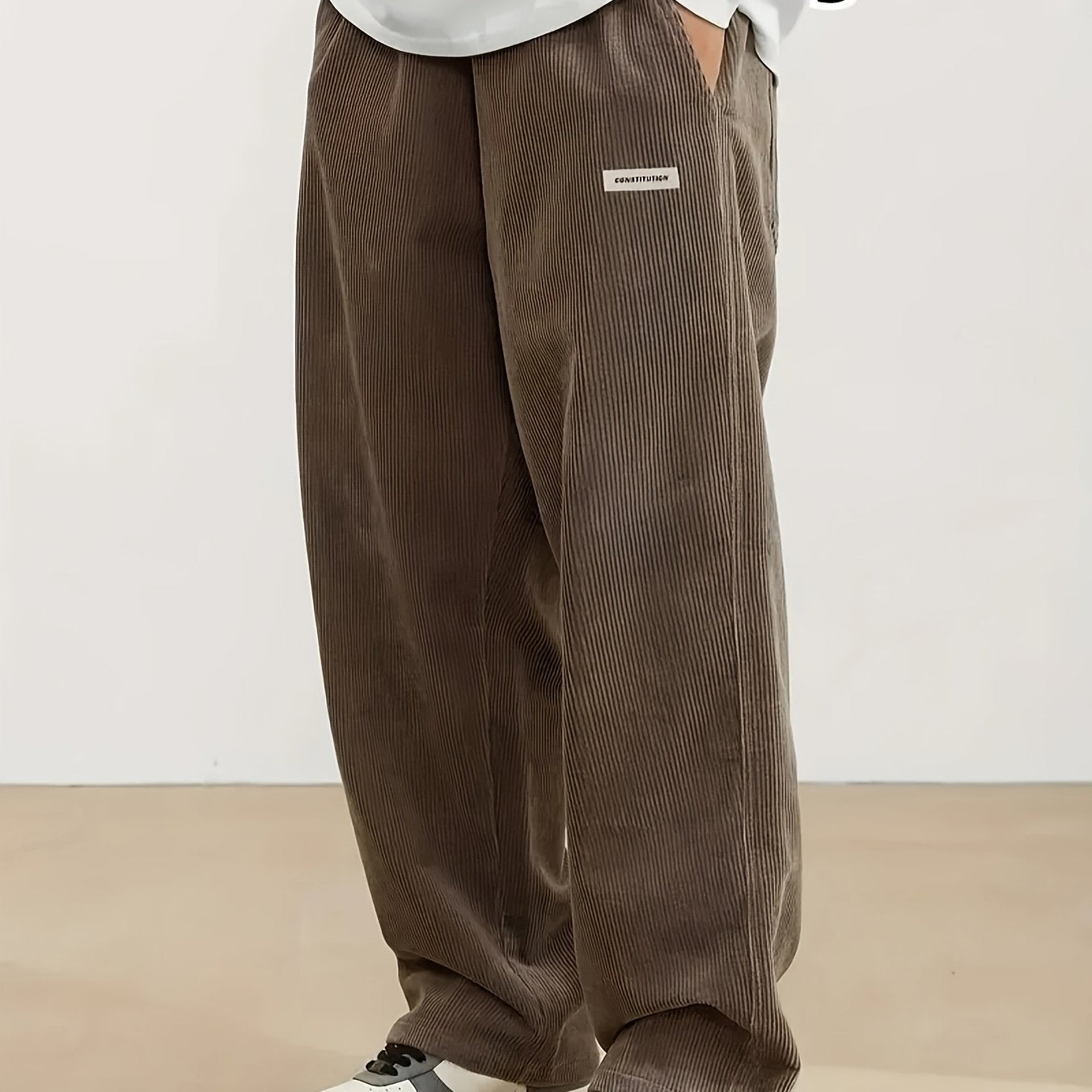 Pantalones de pana de talla grande para hombre con detalle de bolsillo y estampado de letras para otoño e invierno