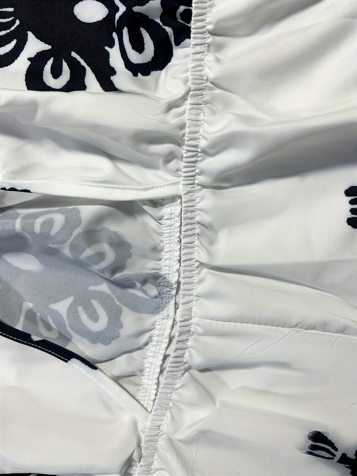 Plus Size Women's V-Neck Floral Romper with Tie Waist Black White Spring Summer