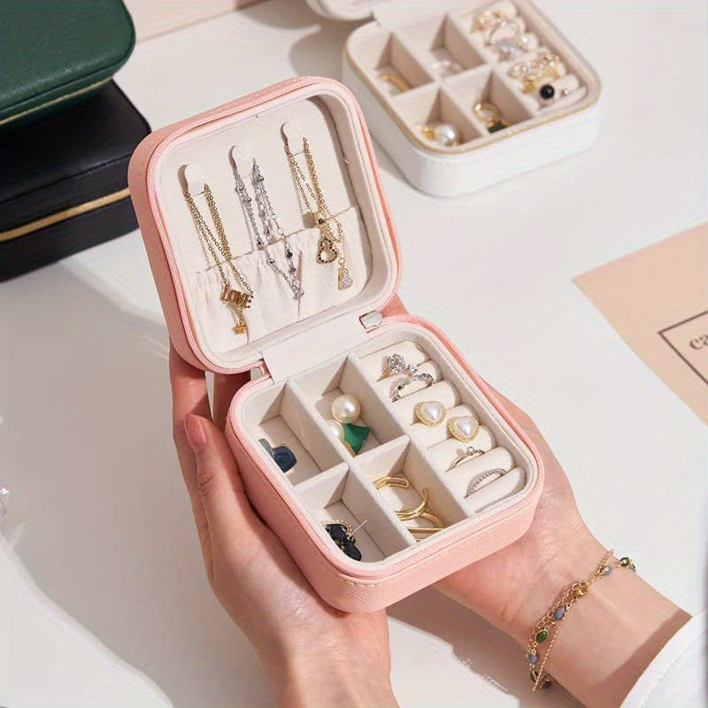 Pequeño organizador de viaje para joyas para anillos, pendientes y collares con compartimentos