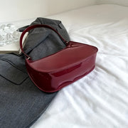 Red Glossy Women's Shoulder Bag with Zipper Closure for Everyday Essentials