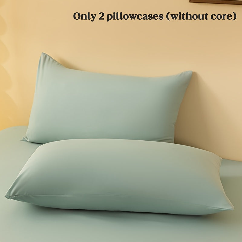 2 ta yostiq qopqog'i, bir rangda, yumshoq va qulay polyester materialidan tayyorlangan, konvert yopilishi bilan, yuvish mashinasida tozalash oson, 90gsm, yotoqxona, mehmonxona yoki mehmonxona to'shagi uchun ideal.