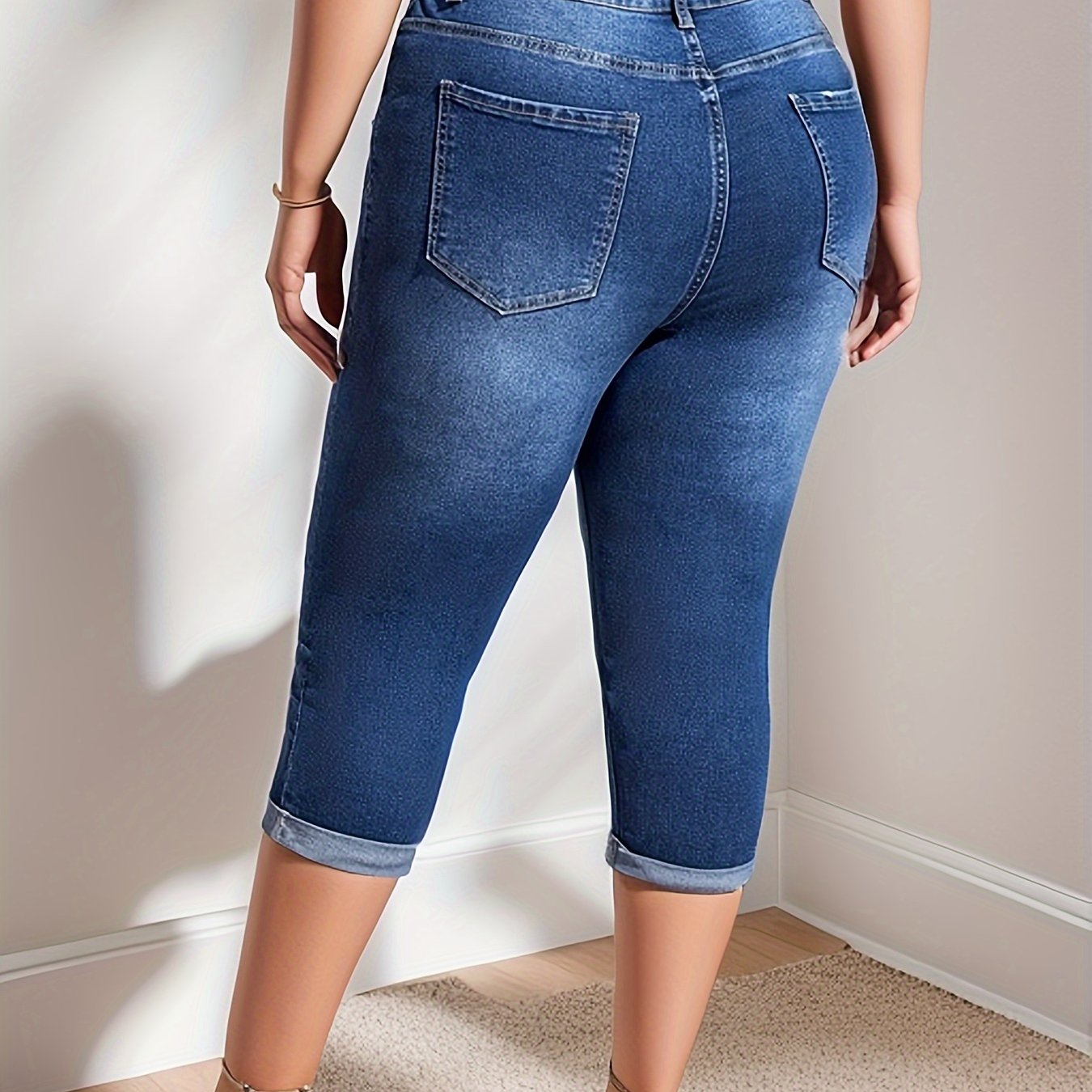 Plus Size Women's High Stretch Denim Capris in Washed Blue with Whiskering