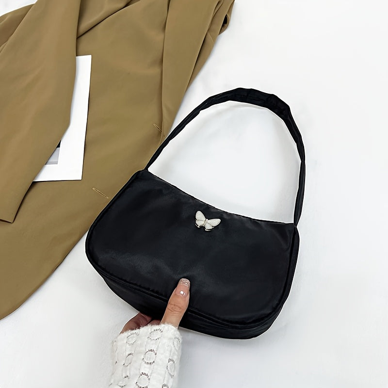 Ayollar uchun qora naylon crossbody sumka, tassel aksenti va zip yopilishi bilan