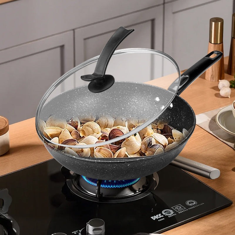 Noxud qotishma, yopishqoq bo'lmagan wok, shisha qopqoq bilan - mustahkam, idish-tovoq yuvish mashinasida yuvish mumkin, gaz va induksion plitalar uchun ideal, oshxona idish-tovoqlari uchun zarur.