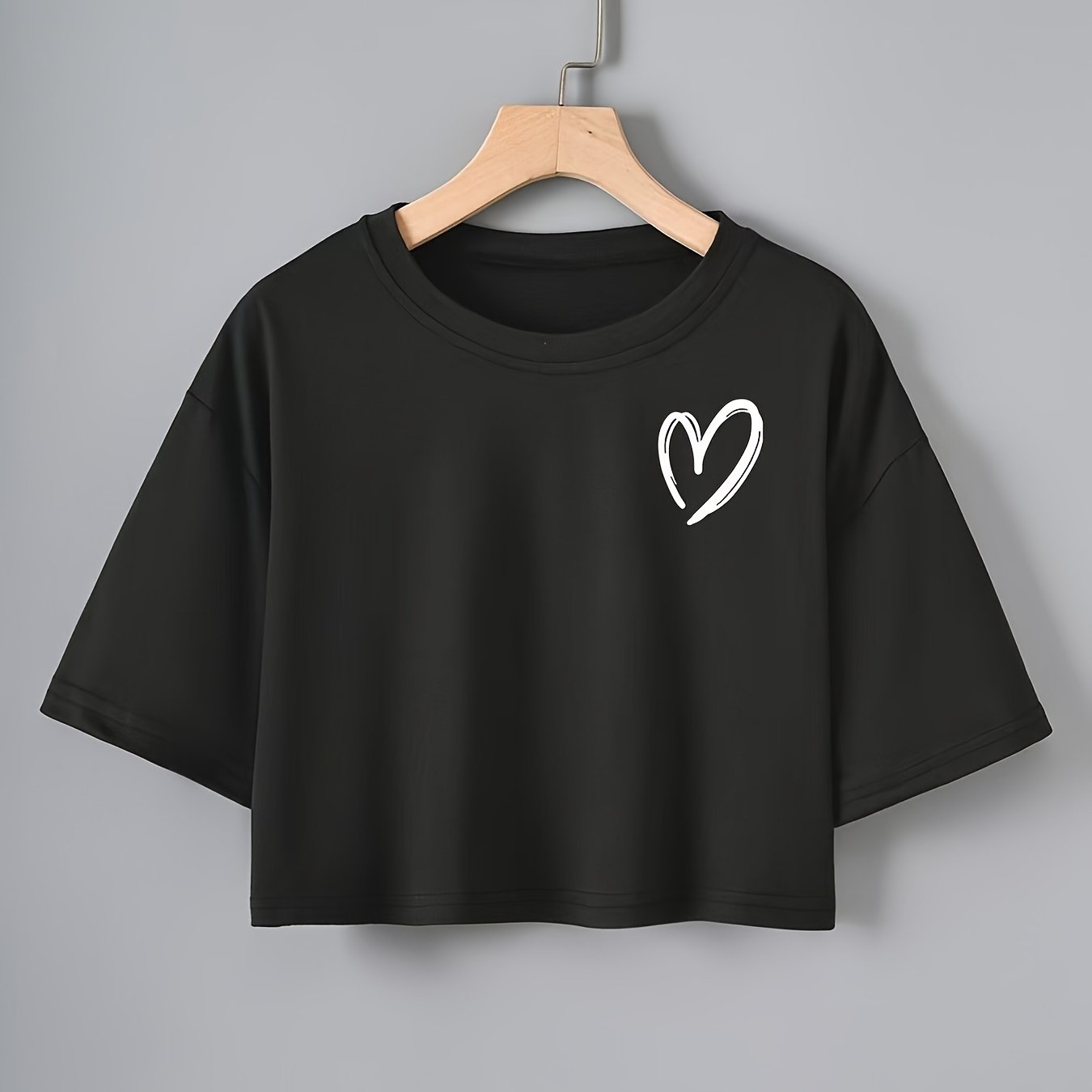 Women's Black Heart Pattern T-Shirt with Crew Neck Short Sleeves for Casual and Sporty Wear