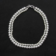 Women's Double Strand Shell Pearl Necklace with Zirconia Inlay and Infinite Clasp
