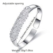 Women’s Ethnic-Inspired Bracelet with Peacock Feather Silk Opening and Phoenix Design