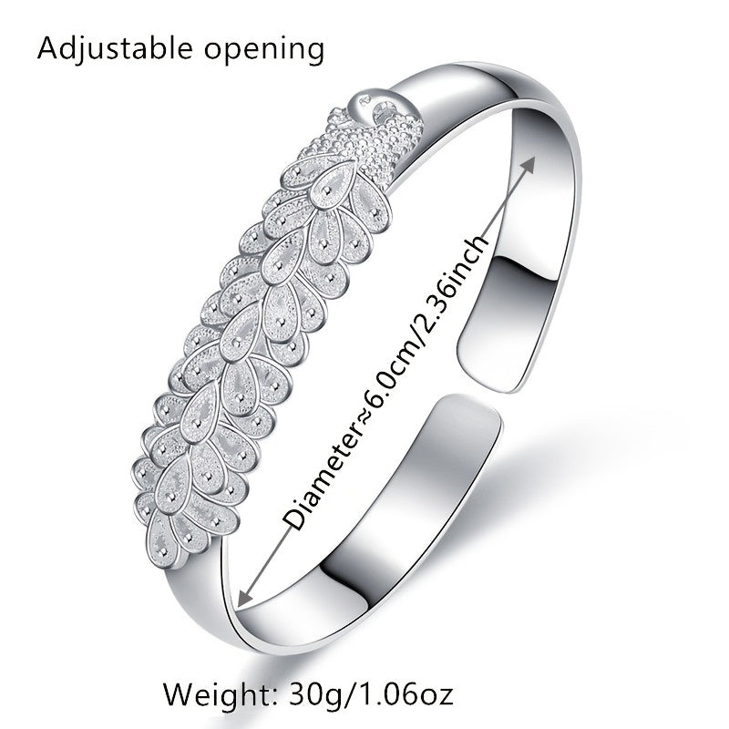 Women’s Ethnic-Inspired Bracelet with Peacock Feather Silk Opening and Phoenix Design