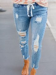 Pantalones vaqueros de mezclilla azul de talla grande con dobladillo rasgado y crudo para mujer