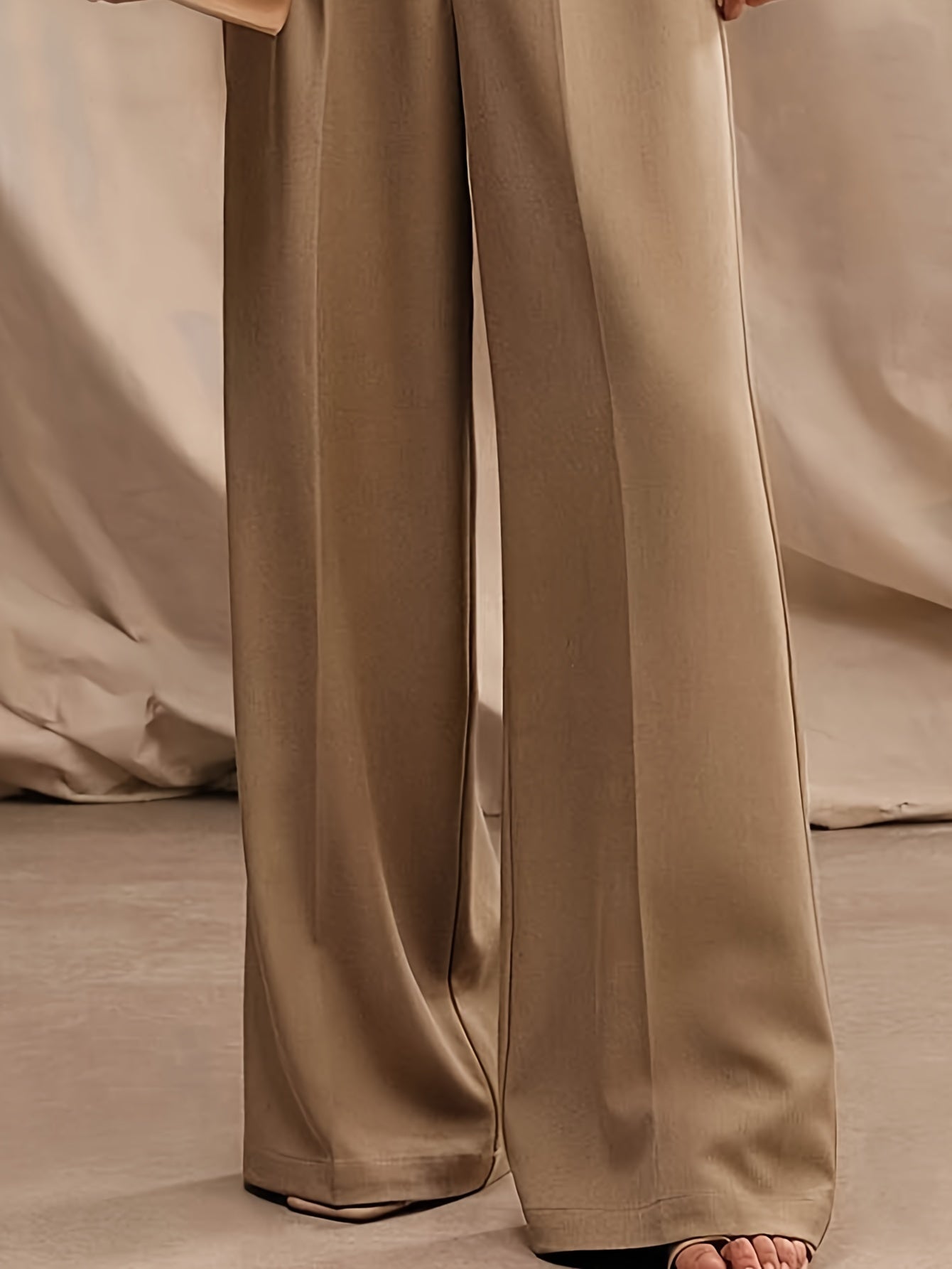 Keng oyoq yuqori bel ayollar shimlari, nafis dizayn, bir rangda, bahor va kuz uchun mos, mashinada yuvish mumkin.