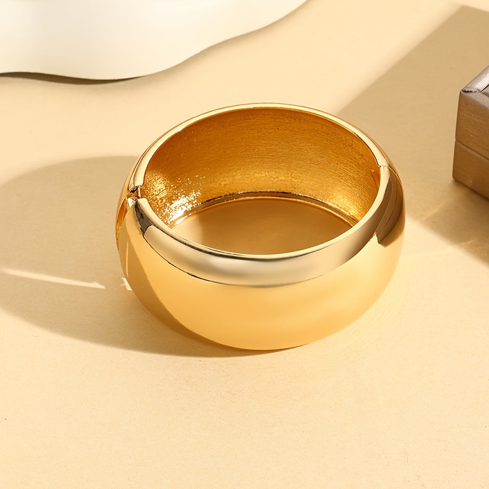 Zarif va silliq zanglamas po'latdan yasalgan baraban bilaguzuk, keng va qalin bangle dizayniga ega. Ushbu ko'p funksiyali moda aksessuari kundalik kiyish yoki sovg'a berish uchun juda mos keladi.