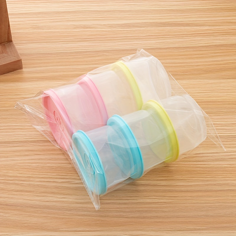 Kichik plastik namunali puding yogurt idishi, yangi oziq-ovqat saqlash uchun muhrlangan quti, muzlatgichda saqlash va mikroto'lqinli pechda isitish uchun mos.