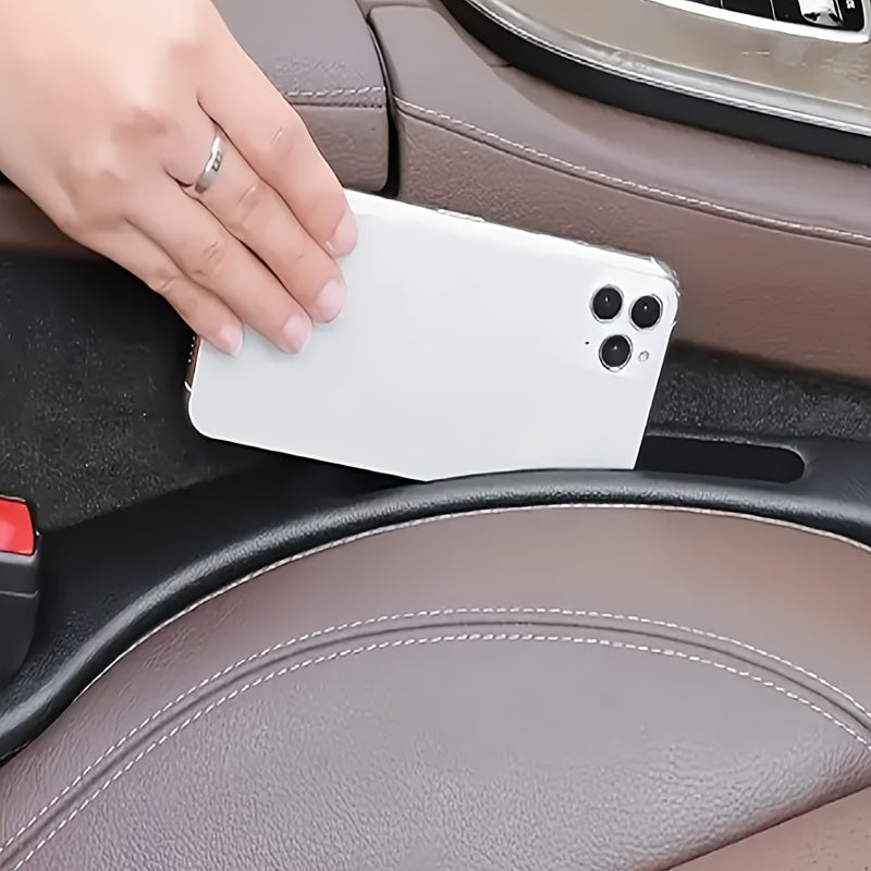 Universal avtomobil o'rindig'i bo'shlig'ini tashkil etuvchi ikki bo'lakli plastmassa tanga, telefon, kalitlar uchun saqlash joyi 2 dona