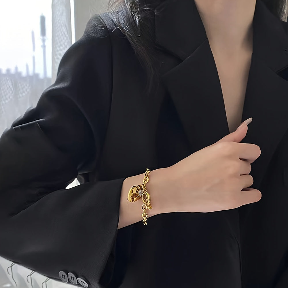 Zarif titan po'latidan yasalgan sevgi yurak bilaguzuk, kubik zirkon bilan, tasodifiy kiyimlar uchun ideal.