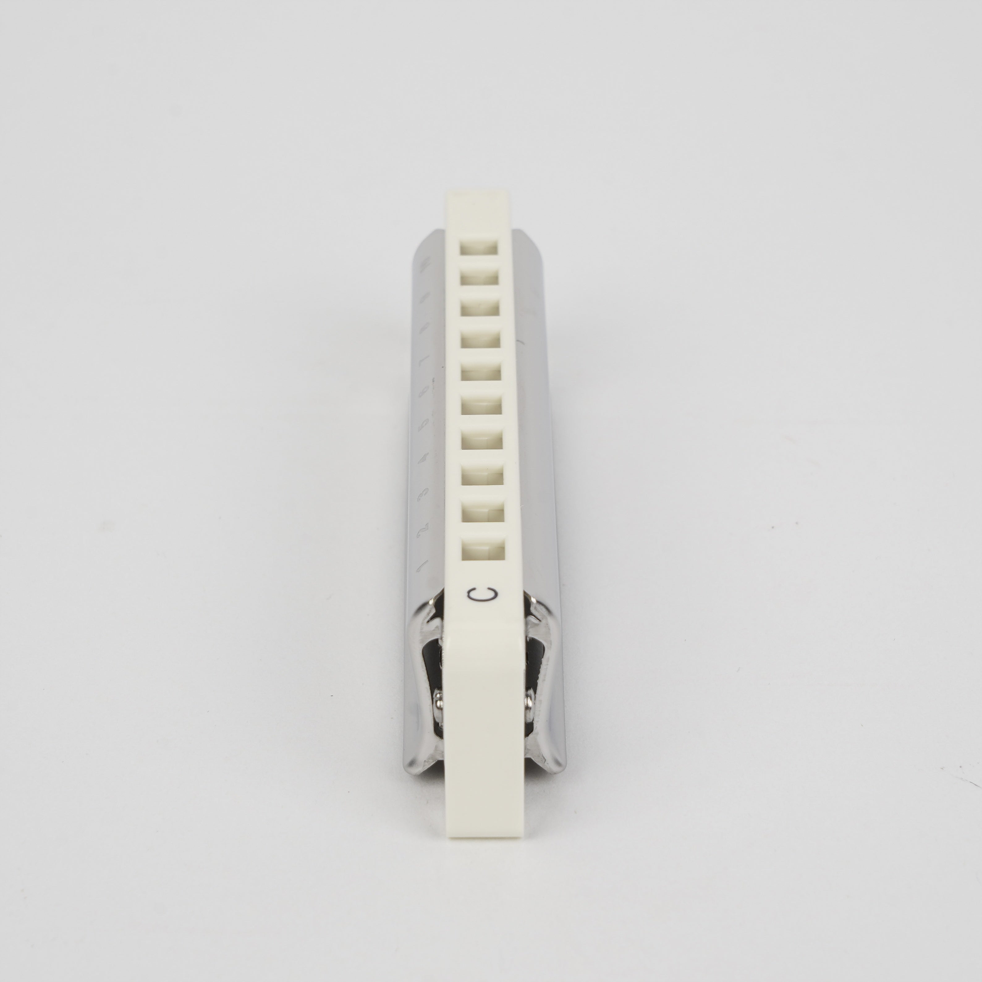 20 teshikli diatonik harmonika, zipli qadoq bilan, zanglamaydigan po'latdan qopqoq, bronza plitasi va qobiqchalari bilan