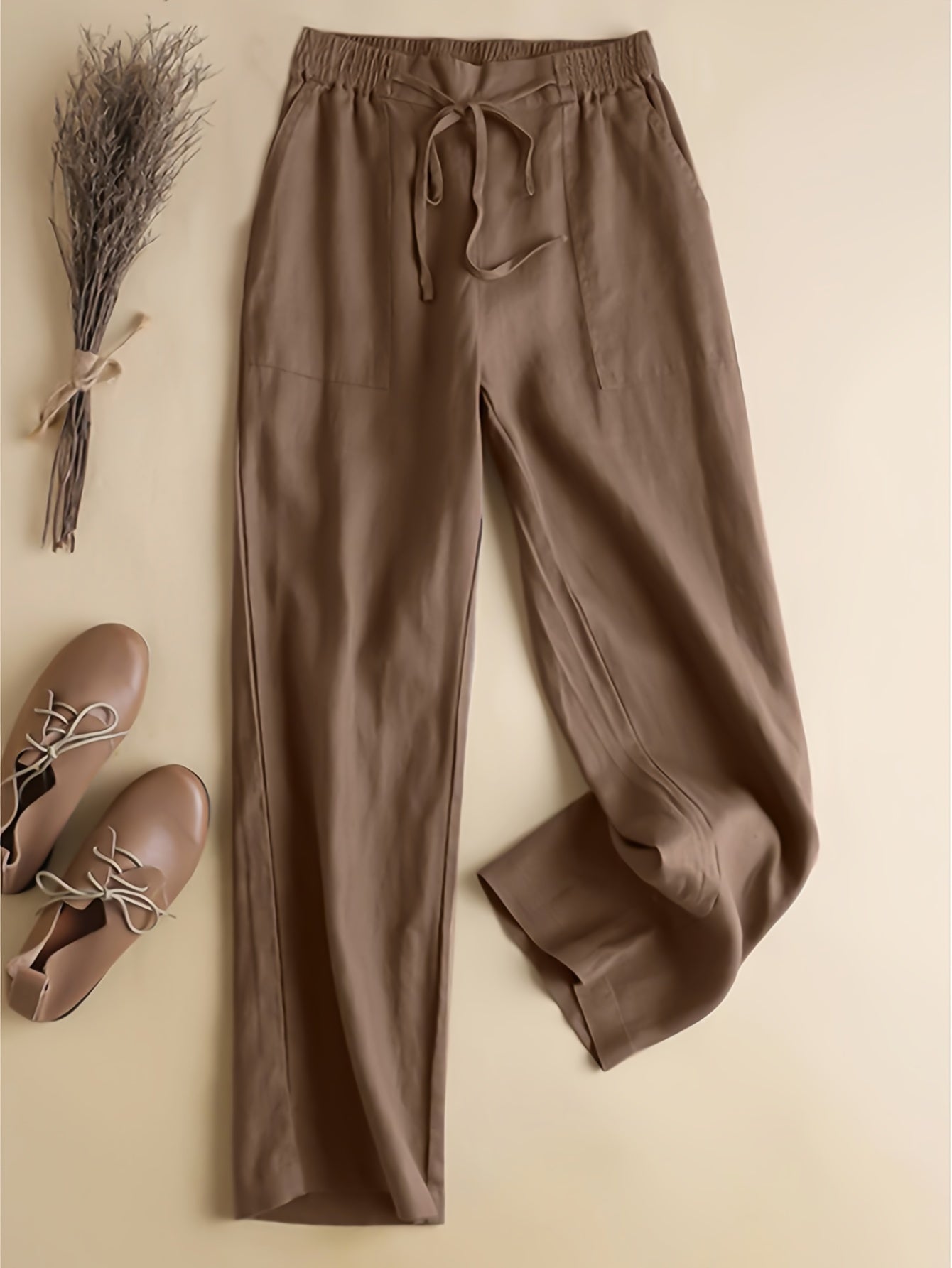 Pantalones de mujer de talla grande con bolsillos inclinados y cintura elástica para primavera y otoño