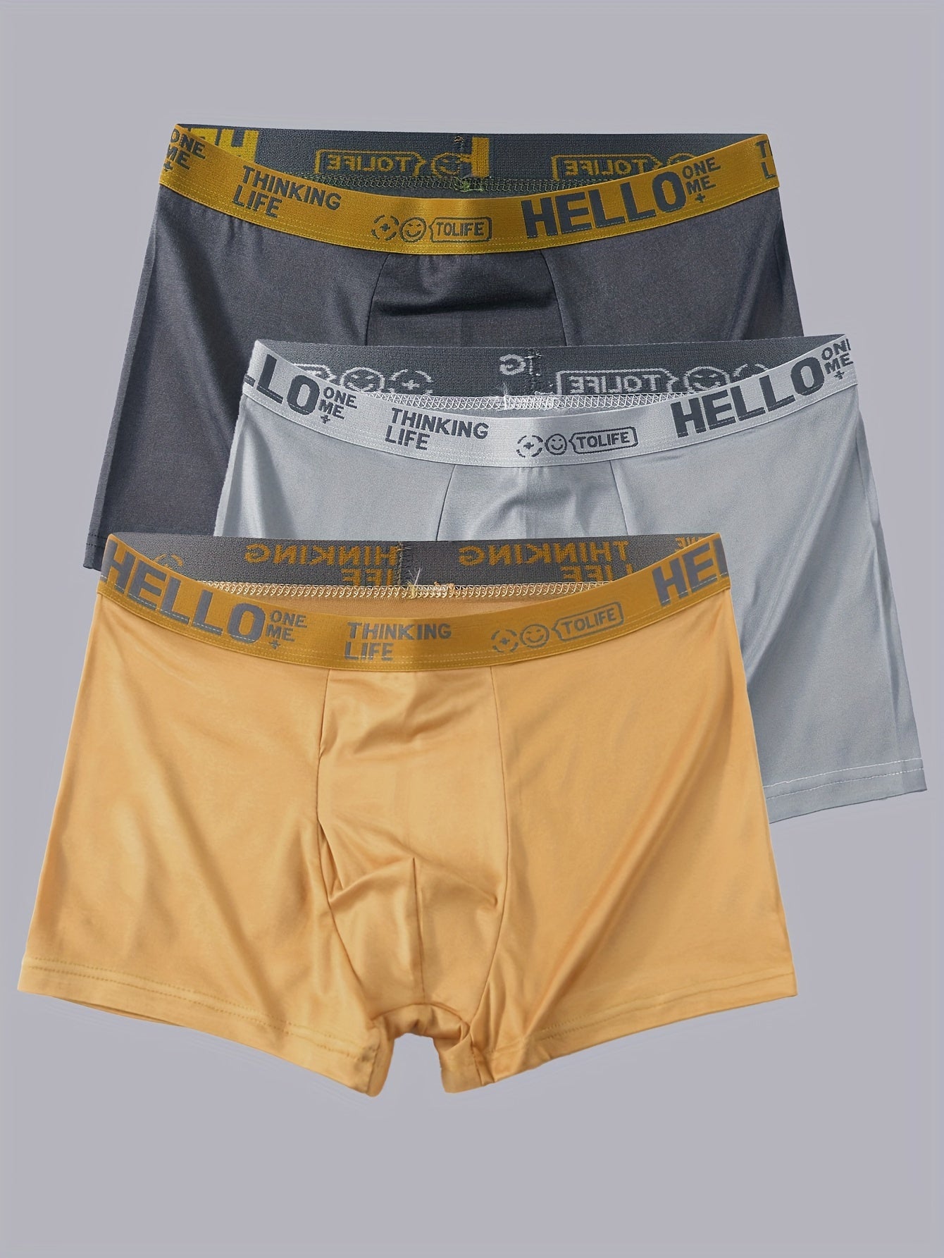 3 dona erkaklar uchun boxer shortlari, turli ranglarda 'Hello' printi bilan, havo o'tkazuvchanligi, qulaylik va tez quritish xususiyatlari uchun polyester/spandeks aralashmasidan tayyorlangan.