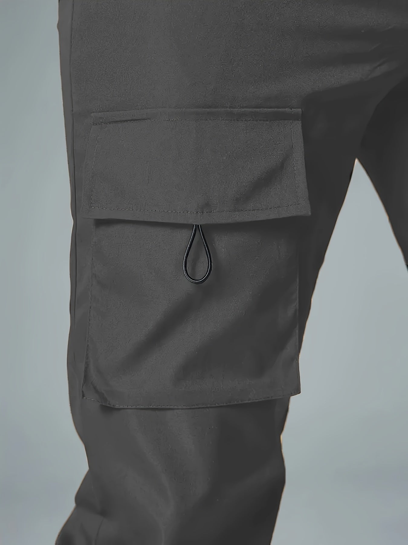 Men's Polyester Cargo Pants with Drawstring Waist and Multiple Pockets for Spring and Fall