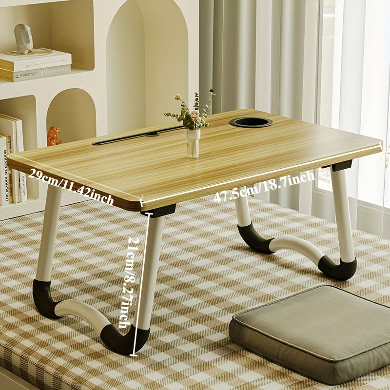 Qayriladigan noutbuk stoli, mustahkam material va keng ish joyiga ega, talaba yotoqxonalari uchun mos.