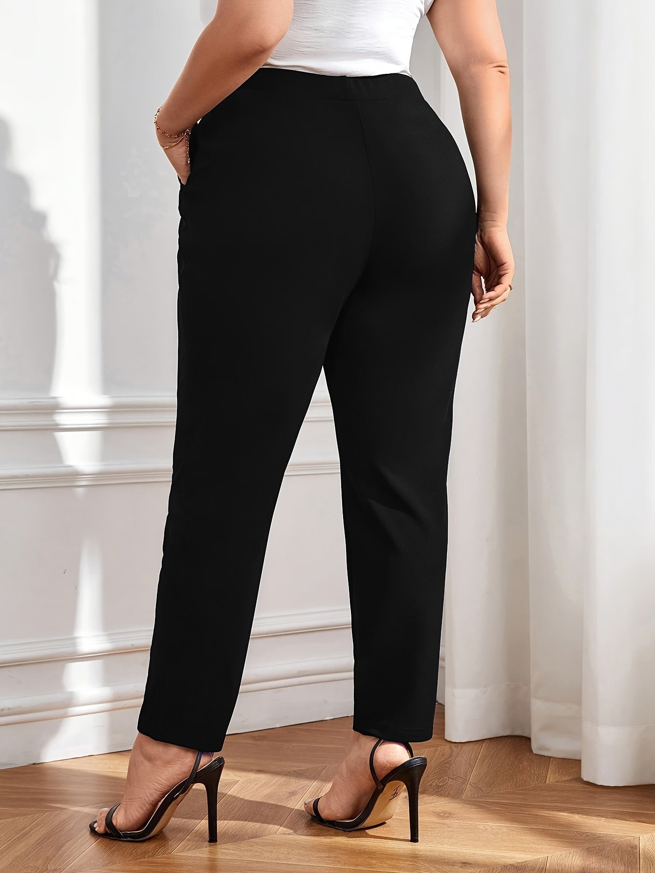 Plus Size Women's Elastic Waist Trousers Solid Color Business Casual Woven Fabric