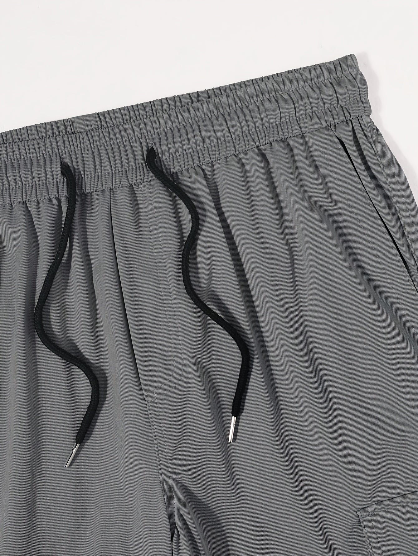 Men Solid Color Cargo Pants with Multiple Flap Pockets and Drawstring Waist for Outdoor Activities