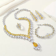 Conjunto de joyería inspirado en Oriente Medio con collar, pulsera, anillo y pendientes de diseño de gota de agua con zirconia y borla