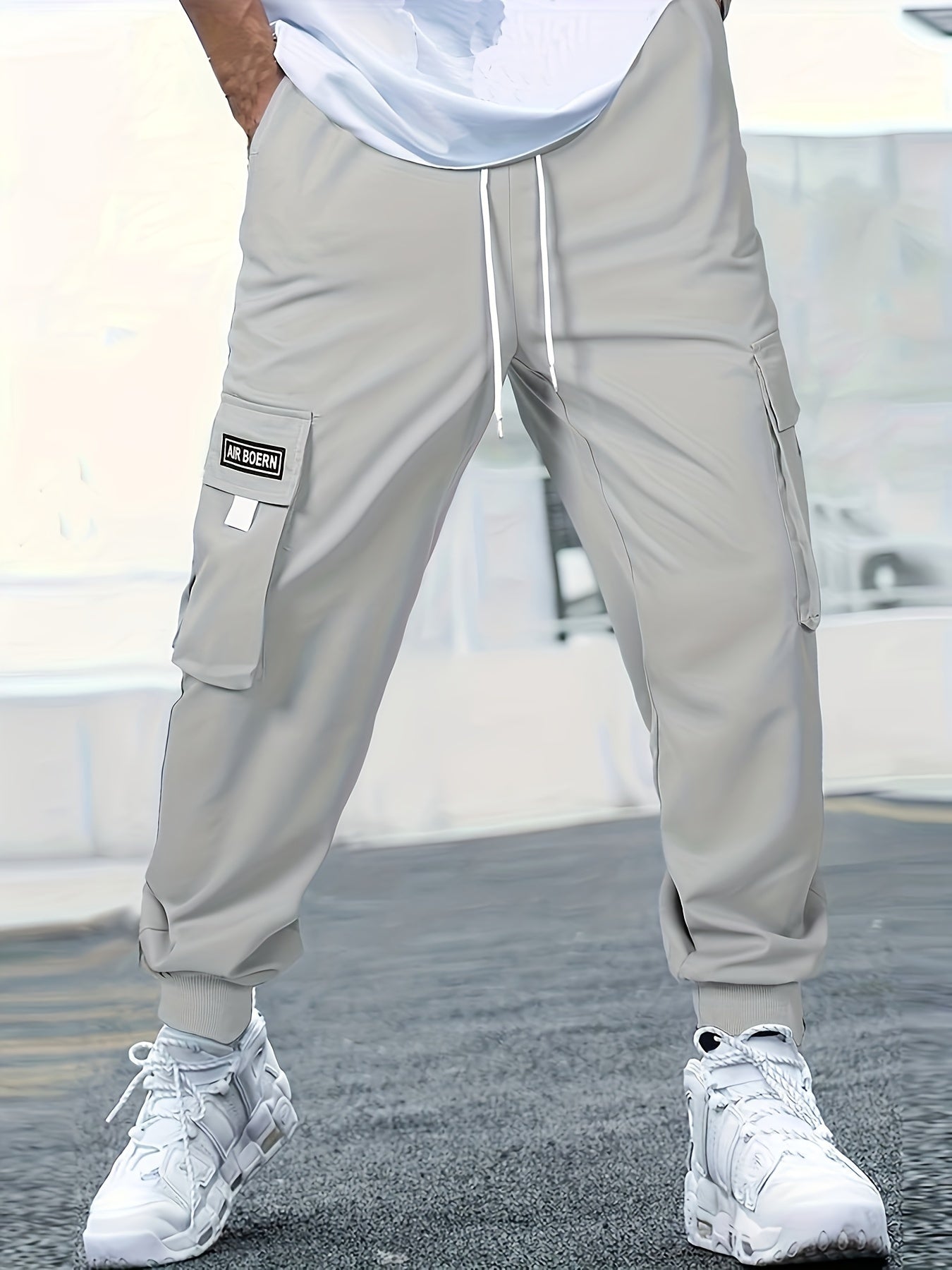 Men's Casual Cargo Pants with Multiple Pockets and Drawstring Tied Feet for Spring 2023