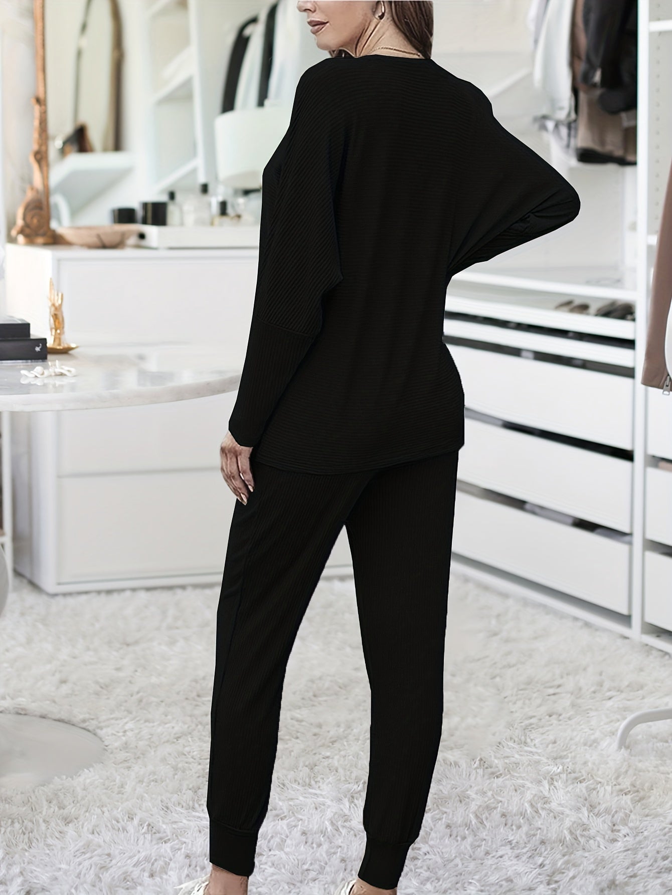 Conjunto de descanso de canalé para mujer con top de manga batwing y pantalones jogger para otoño